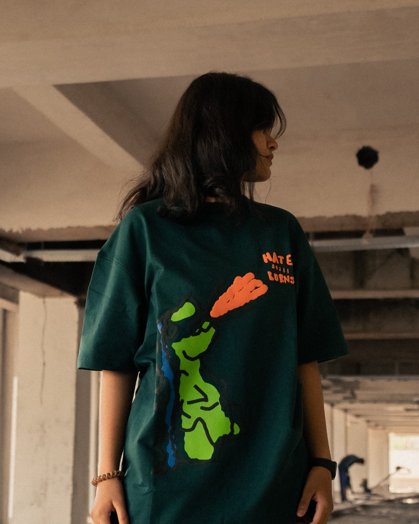 Hate Still Burns Dark Green Tshirt - Front
